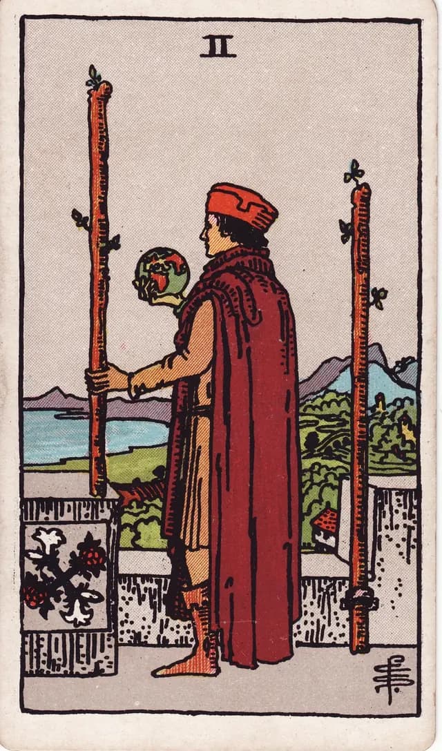 Two of Wands in the Rider-Waite-Smith deck, reversed